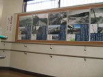 階段踊り場の写真パネル展示（名東図書館　「名東区の今昔　写真と資料展　～亜炭鉱とため池を中心に～」）