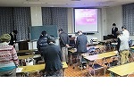 黙とう（天白図書館　講演会「東日本大震災・復興への道のり～流れる時間と震災の記録」）