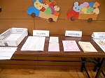 会場には図書館の情報コーナーも。（守山図書館　「もりやまっこ子育て広場in守山」に参加しました）