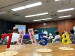 名古屋なんでも調査報告会の様子（鶴舞中央図書館　「名古屋祗園うどん・きしめん調査報告書パネル展示」）