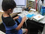 中村図書館「なごやっ子読書ノートで図書館お仕事」返却処理の写真