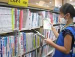 とみだ図書館「なごやっ子読書ノートで図書館お仕事体験」の写真1